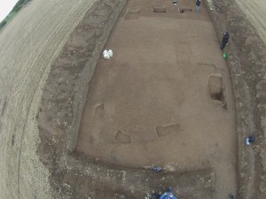 Trench 1 Linear feature running left right across trench in front of camp entrance bit behind titula.